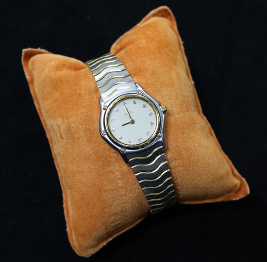 A ladys steel and gold plated Ebel quartz wrist watch with diamond dot markers,